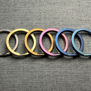 May include: A distressed wooden sign, reading "Welcome to our home" in white. The sign has a rustic finish, ideal for adding a welcoming touch to any home's entrance.