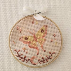 Cross stitch pattern, PDF, magical, moth, pastel, moon, sparkles, butterfly, yellow and orange decoration, fancy