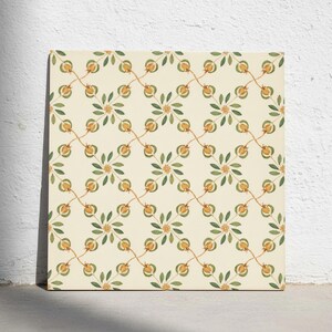 May include: A square tile featuring a repeating botanical pattern on a cream background. The design consists of interconnected thin brown stems forming a diamond grid, with small orange flower buds and clusters of green leaves at each intersection.
