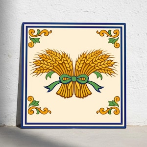 May include: Square tile with a wheat sheaf design. The wheat is yellow and tied with a green bow. The tile has a cream background, a dark blue border, and decorative corner accents in yellow and green.