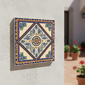 Spanish botanical ceramic tile with geometric border displayed against neutral wall.