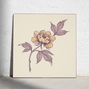 May include: A square wall art print featuring a detailed line drawing of a single peony flower with soft yellow petals and muted purple leaves and stem, set against a solid cream-coloured background with a thin dark border framing the entire image.
