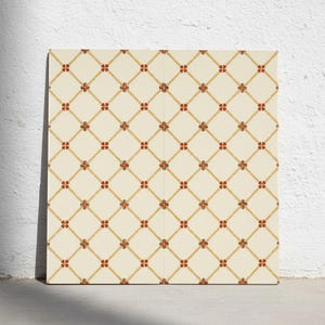 May include: A square tile featuring a cream-coloured background with a repeating diamond grid pattern formed by thin, light brown lines. At each intersection of the grid, there is a small, four-petaled flower motif in shades of orange and brown.