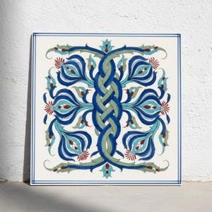 May include: A square ceramic tile featuring a central vertical braided pattern in shades of light and dark blue. The design is flanked by symmetrical floral motifs in blue, turquoise, and red, all enclosed within a thin blue border frame.