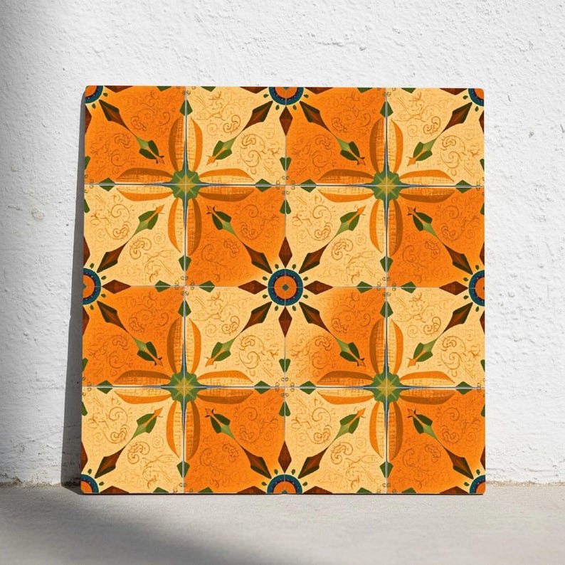 May include: Square tile with a repeating pattern of orange, yellow, and green floral designs. The tile features a symmetrical arrangement of stylized flowers and swirling patterns, creating a decorative and artistic look.