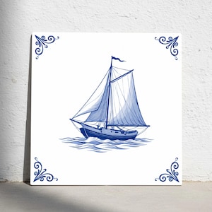May include: Square ceramic tile with a blue and white illustration of a sailboat. The boat has billowing sails and is shown on wavy water. Decorative blue corner accents frame the image, creating a nautical theme.