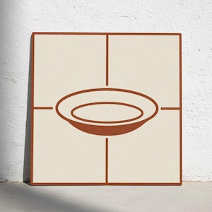 Puede incluir: Una baldosa cuadrada de color crema con una ilustración minimalista marrón de un cuenco. La baldosa está dividida en cuatro secciones por líneas marrones, con el diseño del cuenco centrado.