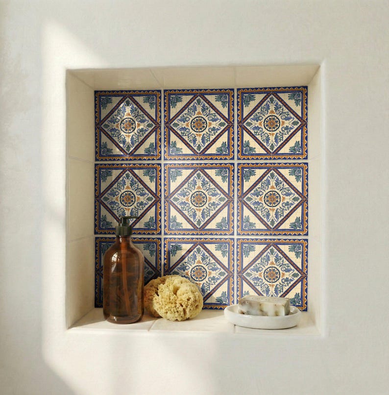 Cádiz style blue and gold ceramic tile used as Mediterranean bathroom accent wall.