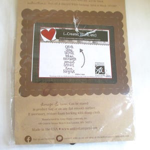 May include: A package of pre-cut unmounted red rubber stamps titled {...Create, Share, etc} by Stephanie Ackerman. The set includes words like Create, Share, Inspire, Believe, Encourage, Remind, Love, and Forgive, packaged on a brown card.