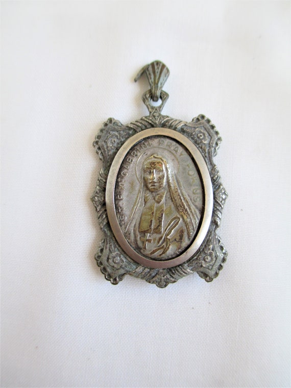 Antique St. Frances Xavier Cabrini Religious Relic Medal Pendant