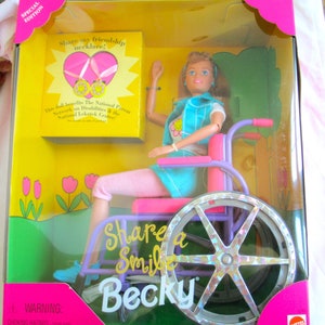 Barbie Doll Vintage 1996 Share a Smile Becky the first 11 inch fashion doll that comes with her own bright pink wheelchair Mint in Box NRFB