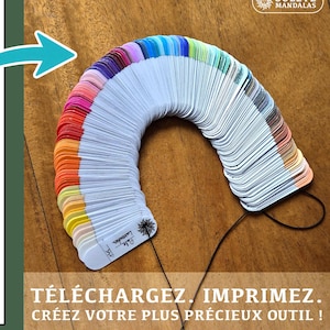 May include: A white printable sheet with mandala designs and a colour swatch fan. The fan displays a spectrum of colours, from red to purple. Text in French reads "TÉLÉCHARGEZ, IMPRIMEZ. CRÉEZ VOTRE PLUS PRÉCIEUX OUTIL !"