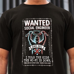 May include: Black t-shirt with a graphic that reads "WANTED SOCIAL ENGINEER" above a silhouette holding a network cable. Below, it says "DAD-SEC" and "I TOLD THE KIDS THE WI-FI IS DOWN."