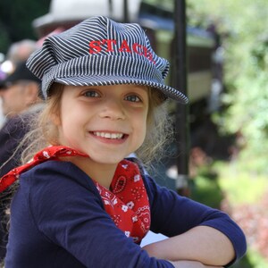 Personalized conductor hat clearance