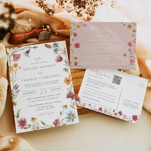 May include: Wedding invitation suite featuring floral designs. The invitation includes a wreath of flowers with the names Willow Monroe and Thomas Parkinson, the date 25th August, and the location of the Summer Valley Hotel. The RSVP card includes a QR code and a space for guests to indicate their dietary requirements.