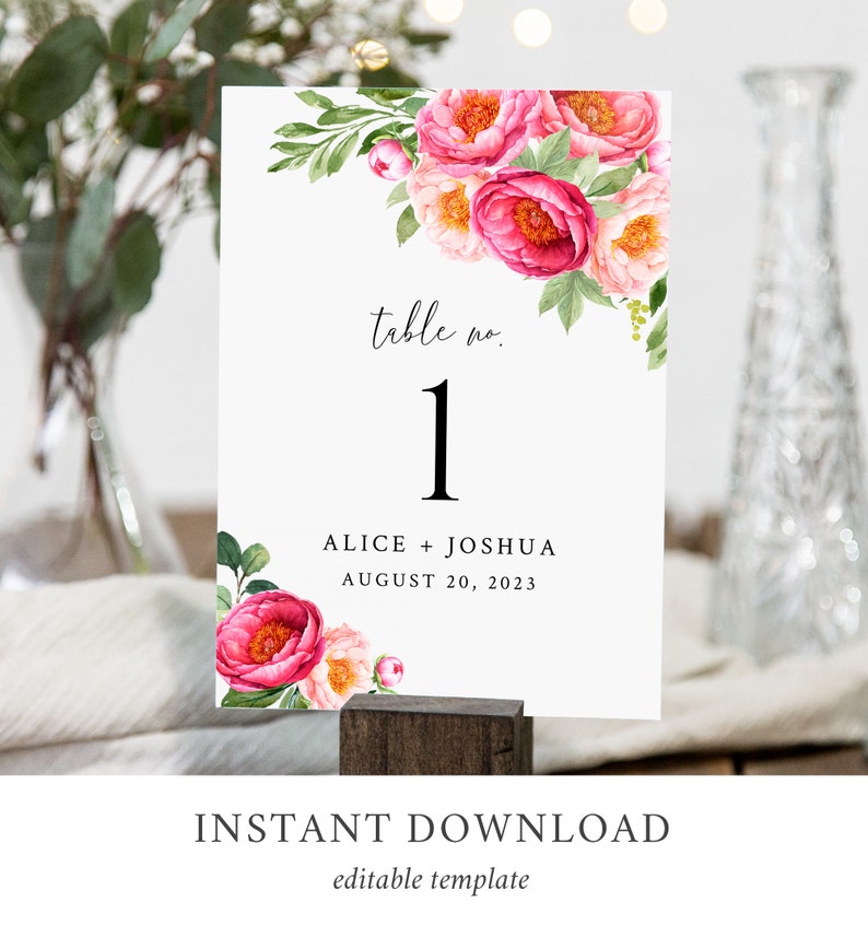 May include: A printable table number card with a floral design featuring pink and peach peonies. The card has the text "table no. 1" and "ALICE + JOSHUA AUGUST 20, 2023".