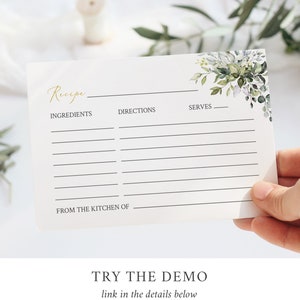 May include: A white recipe card with gold script that says "Recipe". The card has lines for ingredients, directions, and servings. Floral watercolor design in shades of green and gray adorns the upper right corner. The text "TRY THE DEMO" and "link in the details below" are at the bottom.