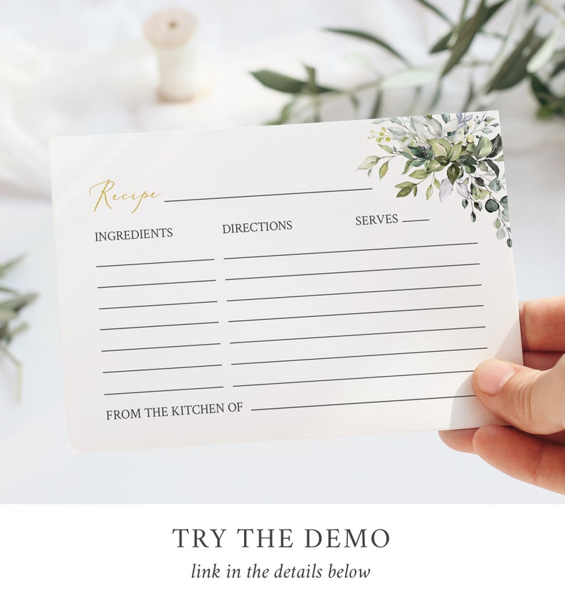 May include: A white recipe card with gold script that says "Recipe". The card has lines for ingredients, directions, and servings. Floral watercolor design in shades of green and gray adorns the upper right corner. The text "TRY THE DEMO" and "link in the details below" are at the bottom.