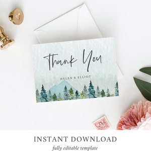 Puede incluir: Una tarjeta de agradecimiento con una ilustraci&oacute;n de acuarela de una cordillera y &aacute;rboles. El texto "Thank You" est&aacute; escrito en letra cursiva negra. Debajo del texto aparece el nombre "Helen & Elliot".