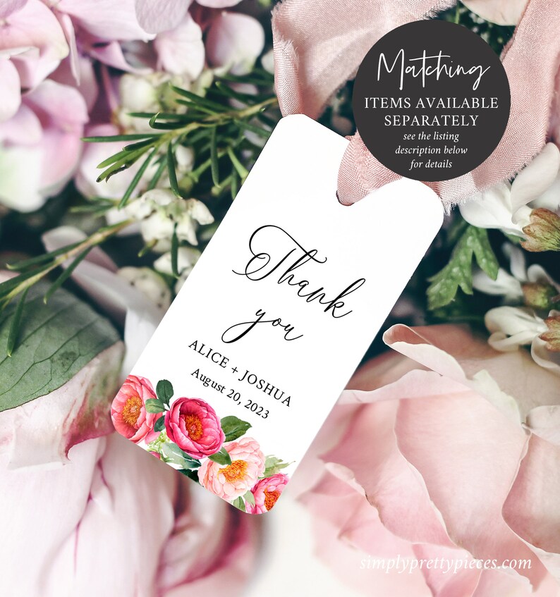 May include: White thank you tag with pink floral design. The tag says "Thank you" in cursive script and "ALICE + JOSHUA August 20, 2023".