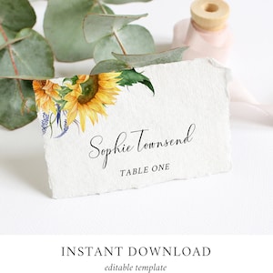 May include: A printable wedding table card with a watercolor sunflower design. The card says "Sophie Townsend, Table One".