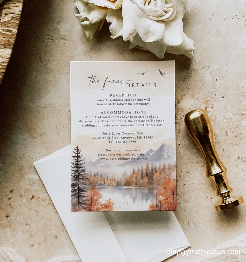 May include: A wedding reception details card with a watercolor illustration of a lake and forest in autumn colors. The card includes the text "the finer DETAILS", "RECEPTION", "Cocktails, dinner and dancing will immediately follow the ceremony.", "ACCOMMODATIONS", "A block of hotel rooms have been arranged at a discount rate. Please reference the Parkinson/Hodgson wedding and make your reservation by October 1st.", "North Lakes Country Club", "123 Atlantic Blvd, Anytown, MN 12345", "Tel: 123 456 7890", "For more information, please visit our wedding website", "www.ourweddingwebsite.com".