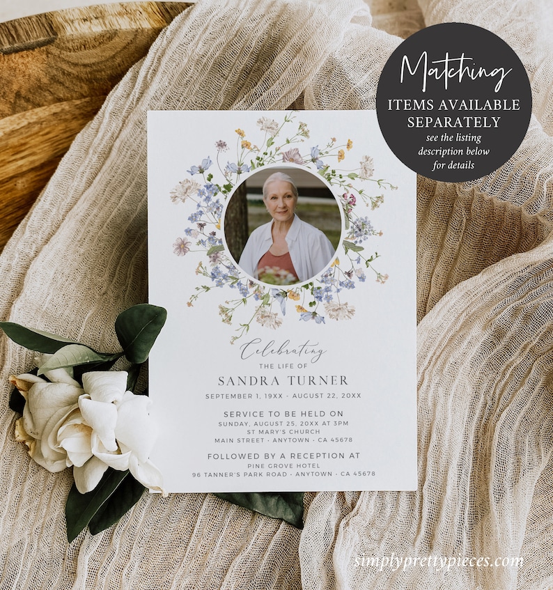 May include: A memorial service announcement card featuring a floral wreath design and a photograph of a woman. The card includes the name Sandra Turner, dates of birth and death, service details, and reception information.