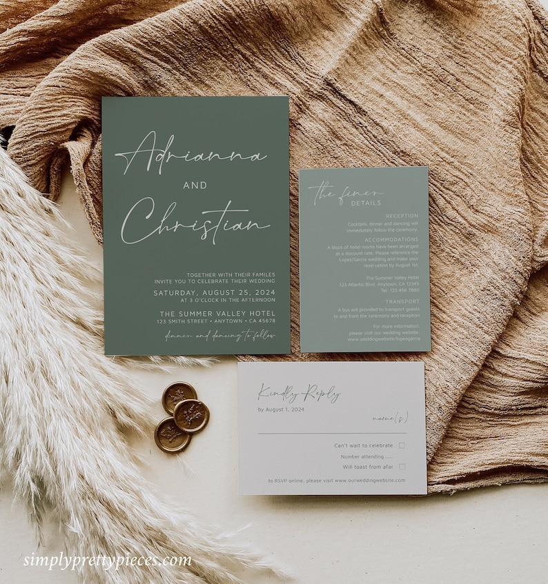 May include: A sage green wedding invitation suite with white calligraphy. The invitation card features the names "Adrianna and Christian" and details about the wedding ceremony and reception. The RSVP card includes the text "Kindly Reply by August 1, 2024".