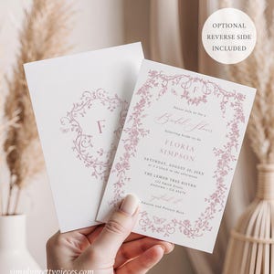 May include: A pink and white floral design bridal shower invitation with the text "Please join us for a Bridal Shower honoring bride-to-be Floria Simpson Saturday, August 20, 20XX at 3 o'clock in the afternoon The Lemon Tree Bistro 123 Smith Street Anytown, CA 43678 Amazon and Pottery Bars"