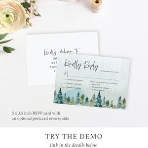 May include: A 5 x 3.5 inch RSVP card with a watercolor mountain scene and a postcard reverse side. The card has a section for guests to indicate their choice of entree: Roast Beef, Herb Roasted Chicken, or Poached Salmon. The text "Kindly Reply" is written in cursive at the top of the card.