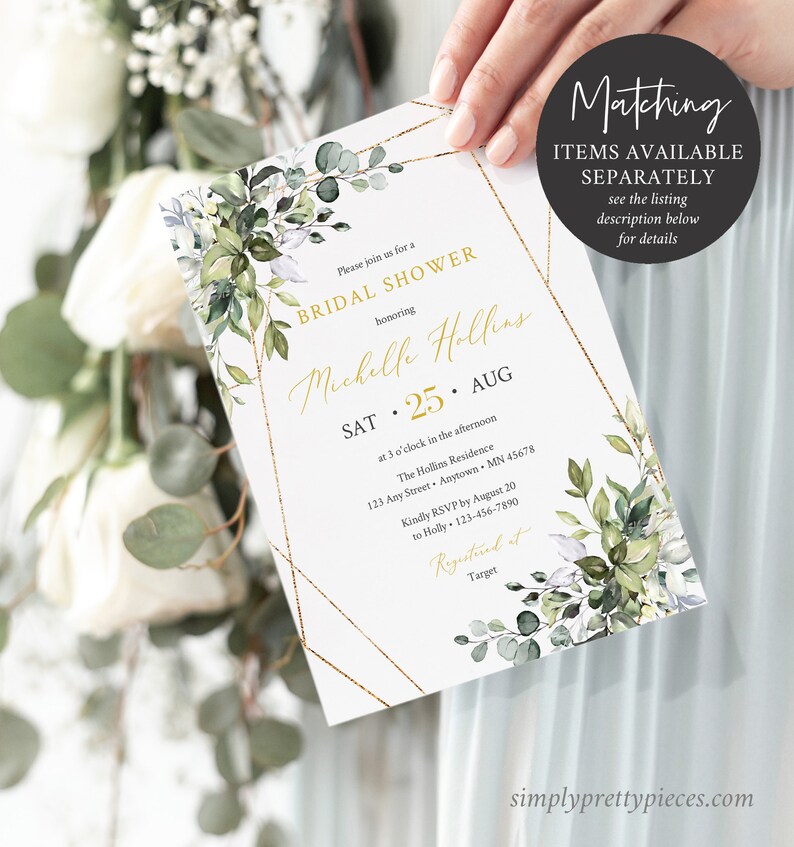 May include: A white bridal shower invitation with gold geometric borders and floral accents. The invitation includes the text "BRIDAL SHOWER" and details for the event, including the date, time, and location. The invitation is held by a person.