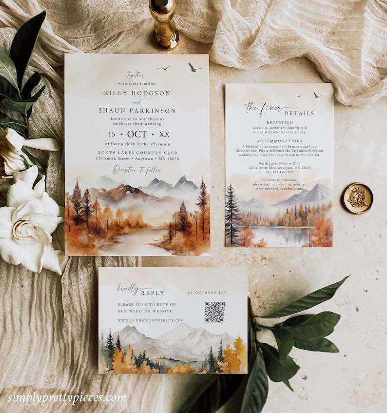 May include: A wedding invitation suite with a watercolor illustration of a mountain landscape with a lake and trees in autumn colors. The invitation includes the names Riley Hodgson and Shaun Parkinson, the date October 15th, and the location North Lakes Country Club. The RSVP card includes a QR code for guests to respond online.