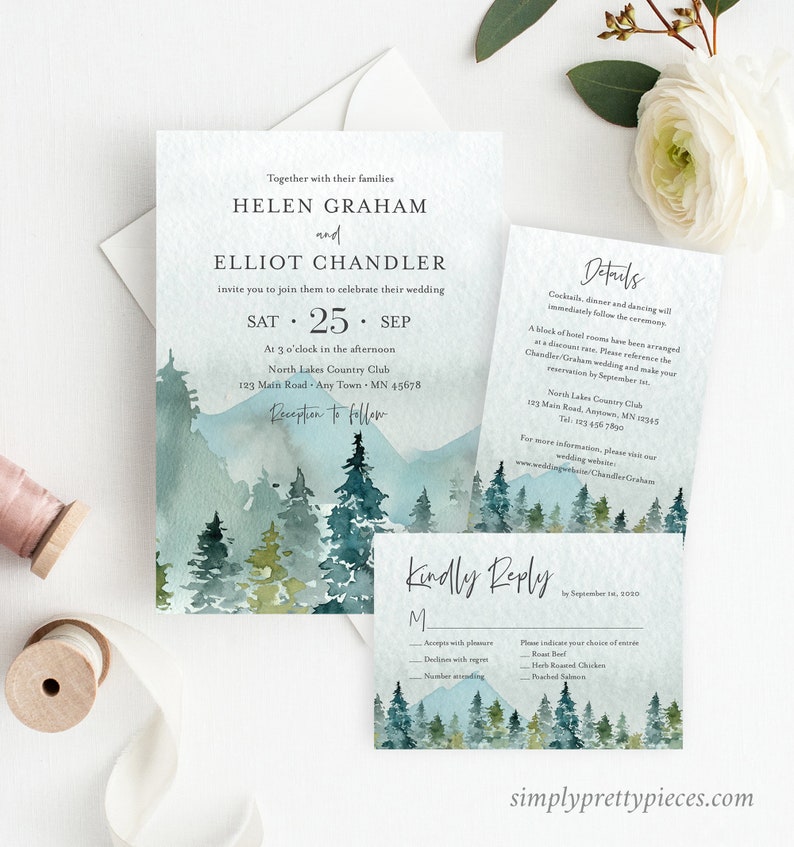 May include: Wedding invitation suite with a watercolor illustration of a forest and mountains. The invitation features the names Helen Graham and Elliot Chandler, the date September 25th, and the location North Lakes Country Club. The RSVP card includes a choice of entrees: Roast Beef, Herb Roasted Chicken, or Poached Salmon.