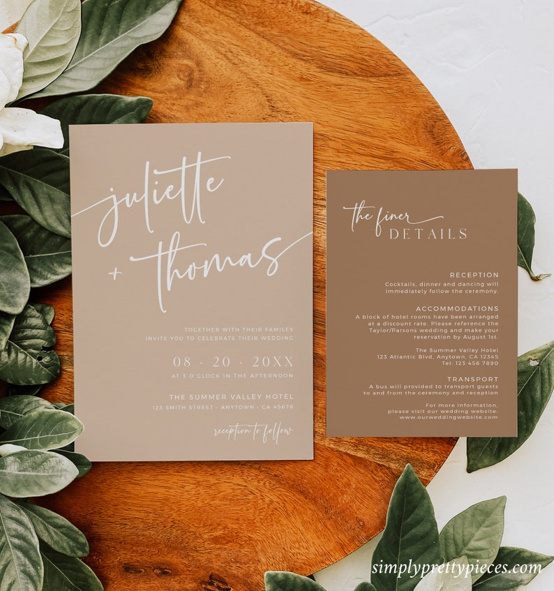 May include: A beige wedding invitation suite with white calligraphy. The top card reads "juliette + thomas" and the bottom card reads "The finer details" with information about the reception, accommodations, and transportation.