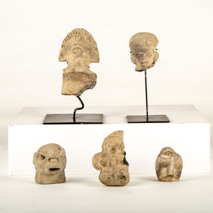 A 5 pieces Pre-Columbian Tumaco Carved Clay Head and Figures Collection.   approximately 300A.C