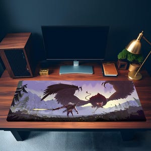 May include: A rectangular mousepad featuring a fantasy illustration of a winged creature and a warrior in a landscape with a sword. The color palette includes shades of purple, brown, and gray.