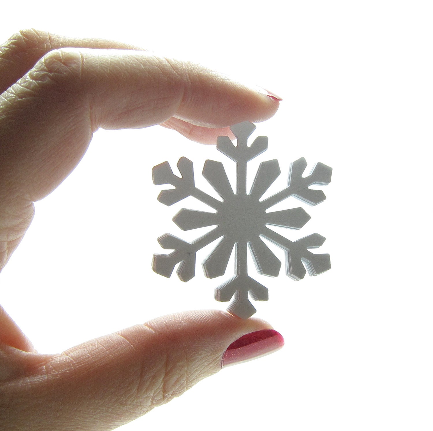 Paper Punch Snowflakes - Craftulate