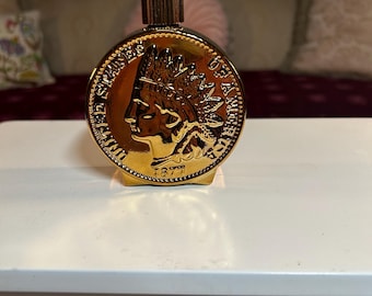 Frasco de loción para después del afeitado Avon Indian Head Penny, color cobre (tamaño completo)