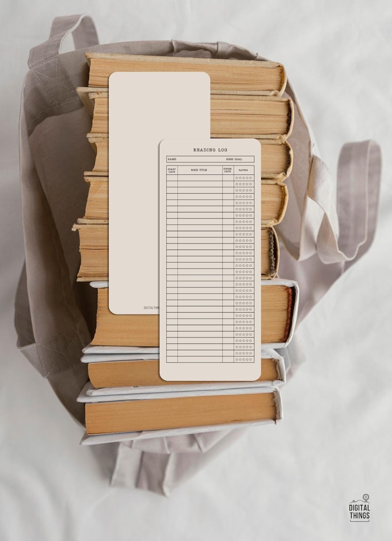 May include: A stack of vintage books with aged, yellowed pages and a beige reading log. The reading log has a lined layout with the text "Reading Log" at the top. A beige tote bag is in the background.