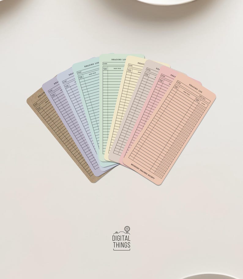 May include: A collection of pastel-colored reading log cards fanned out on a white surface. Each card has a unique color, including tan, purple, light blue, green, yellow, pink, and peach. The cards are lined and labeled for recording book details.