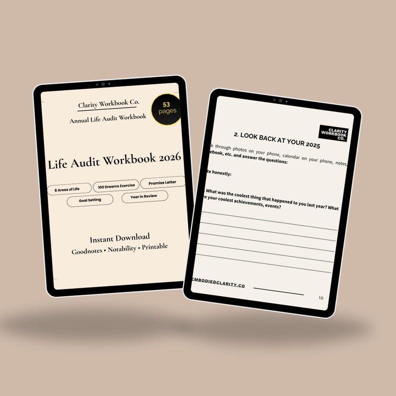 May include: Two black tablets displaying a digital workbook. The workbook is titled "Life Audit Workbook 2026" and includes sections for goal setting and self-reflection. The workbook is an instant download and printable.