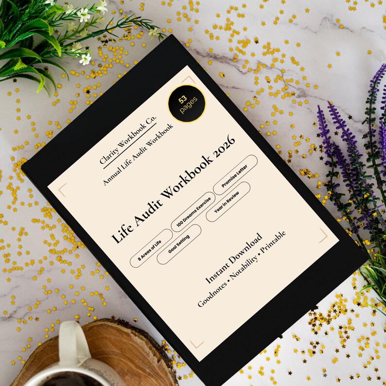 May include: A black workbook titled "Life Audit Workbook 2026" with 53 pages. The cover includes the text "Clarity Workbook Co." and "Annual Life Audit Workbook." Additional text includes "8 Areas of Life," "Goal Setting," and "Instant Download."