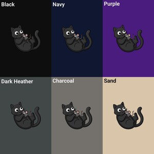 May include: A graphic featuring a black cat holding a mouse, presented against backgrounds of black, navy, purple, dark heather, charcoal, and sand. The cat has large eyes and a playful pose, with the mouse in its paws.
