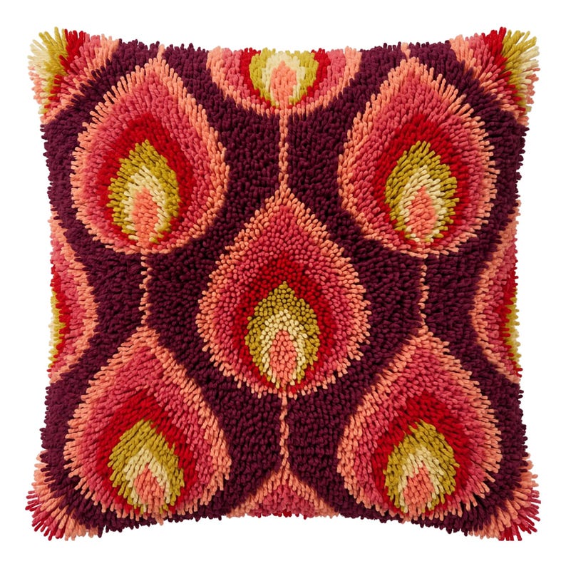 May include: A square throw pillow featuring a shaggy, tufted texture with a repeating teardrop or flame-like pattern. The design incorporates deep plum, vibrant pink, coral, and chartreuse green colors arranged in a symmetrical layout.