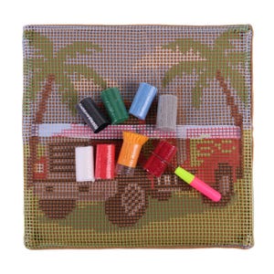 May include: A square needlepoint canvas featuring a printed design of a camper van and palm trees, accompanied by eight small bundles of colored yarn and a metal needle tool with a pink and yellow handle for crafting and embroidery projects.