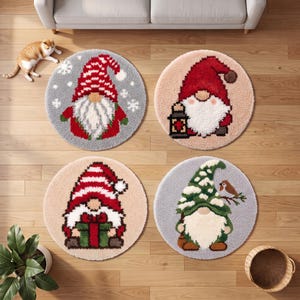 May include: Four circular tufted rugs featuring gnome designs. One gray rug shows a gnome with a red striped hat and snowflakes. One beige rug shows a gnome with a red hat holding a lantern. One beige rug shows a gnome holding a green gift. One gray rug shows a gnome with a green hat and a bird.