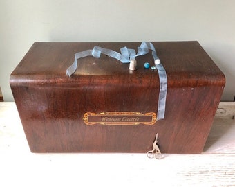 A Sewing machine tiger Wood Carryng Case Western Electric
