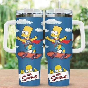 May include: Two blue insulated tumblers featuring Bart Simpson skateboarding against a sky background with clouds. Each tumbler has a white handle and lid, and the text "The Simpsons" is displayed at the bottom.