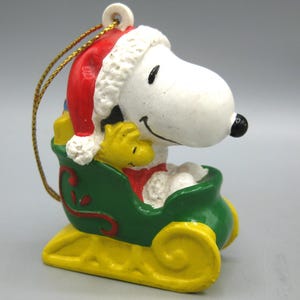 Vintage Peanuts Snoopy & Woodstock Santa Claus Sleigh Hard Rubber Plastic Christmas Ornament