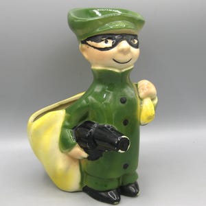 Portamonedas de cerámica vintage de los años 50 con diseño de ladrón para hombre